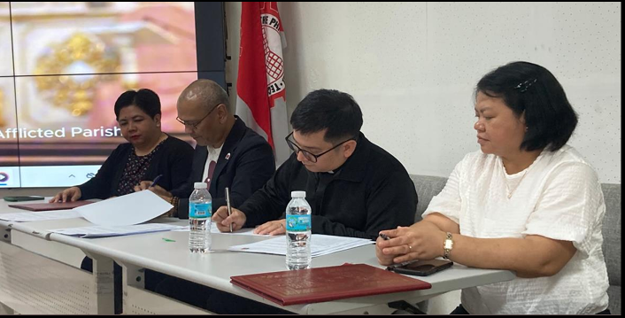 TUP and Mary, Comforter of the Afflicted Parish Church Seal Collaborative Agreement for  Church Redevelopment and Community Advancement